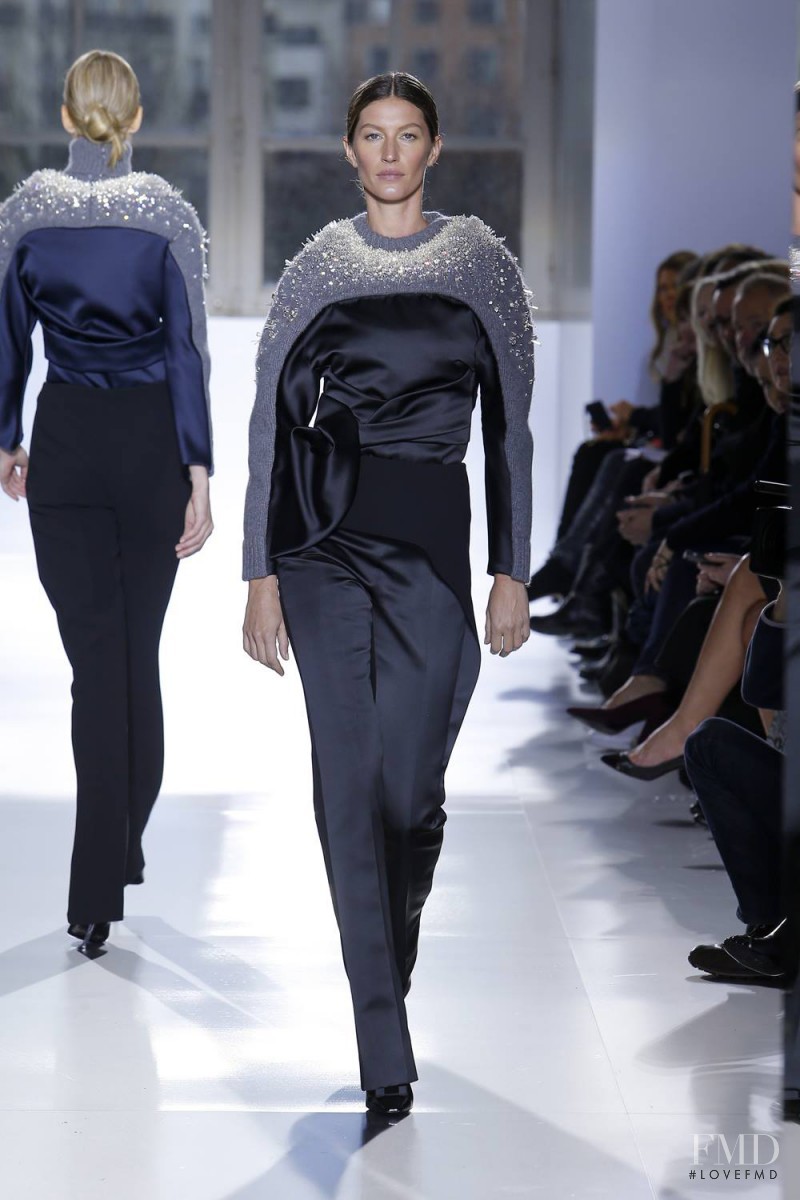 Gisele Bundchen featured in  the Balenciaga fashion show for Autumn/Winter 2014