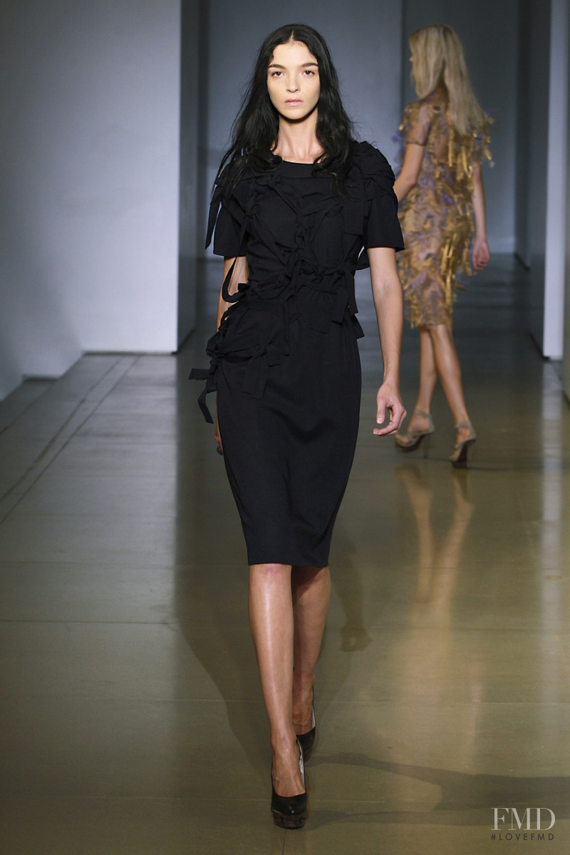 Mariacarla Boscono featured in  the Jil Sander fashion show for Spring/Summer 2010