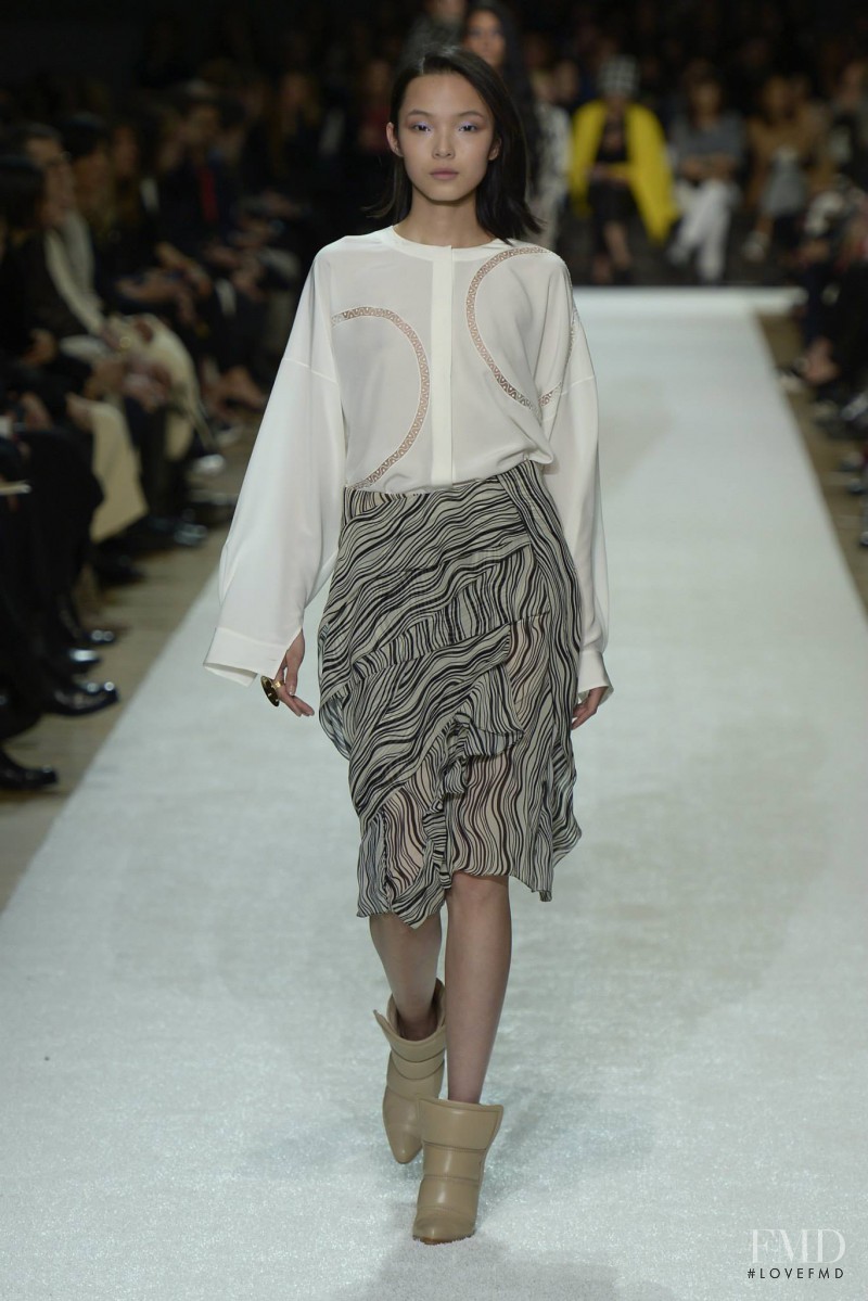 Xiao Wen Ju featured in  the Chloe fashion show for Autumn/Winter 2014