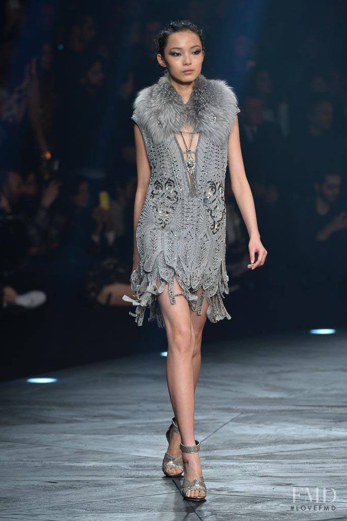 Xiao Wen Ju featured in  the Roberto Cavalli fashion show for Autumn/Winter 2014