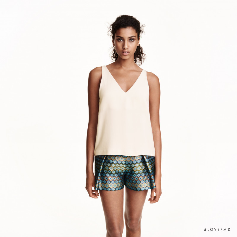 Imaan Hammam featured in  the H&M catalogue for Summer 2015