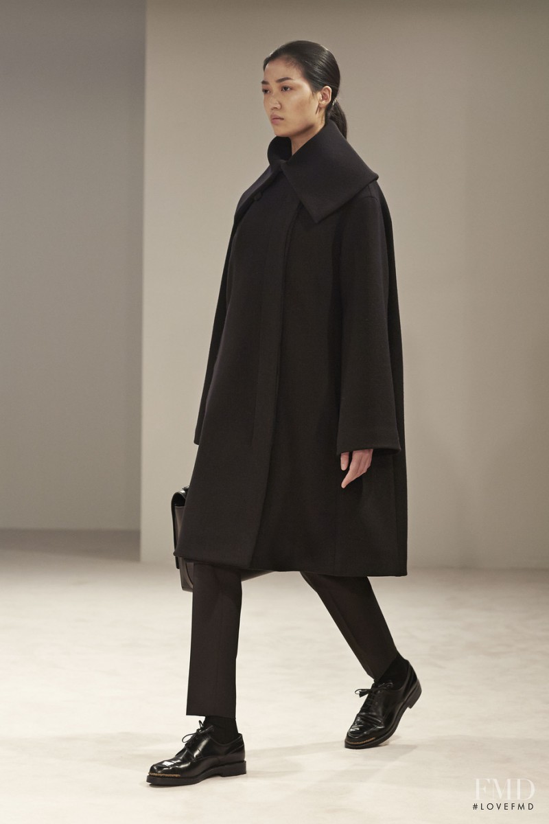 Qi Wen featured in  the The Row fashion show for Autumn/Winter 2014