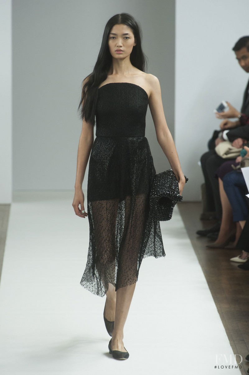 Qi Wen featured in  the Osmany Laffita fashion show for Spring/Summer 2014