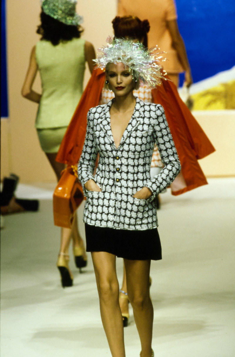 Nadja Auermann featured in  the Chanel fashion show for Spring/Summer 1995