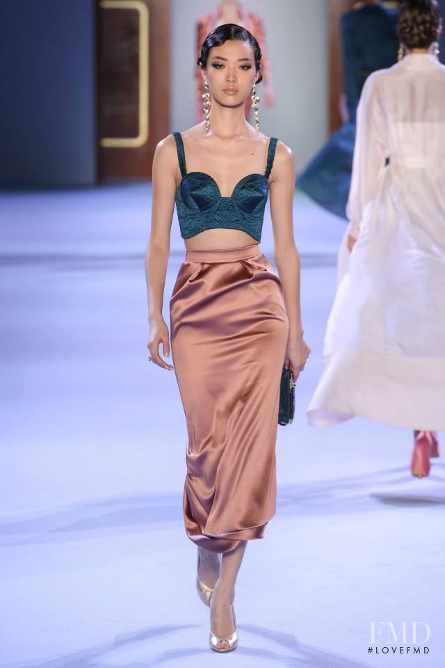 Tian Yi featured in  the Ulyana Sergeenko fashion show for Spring/Summer 2014