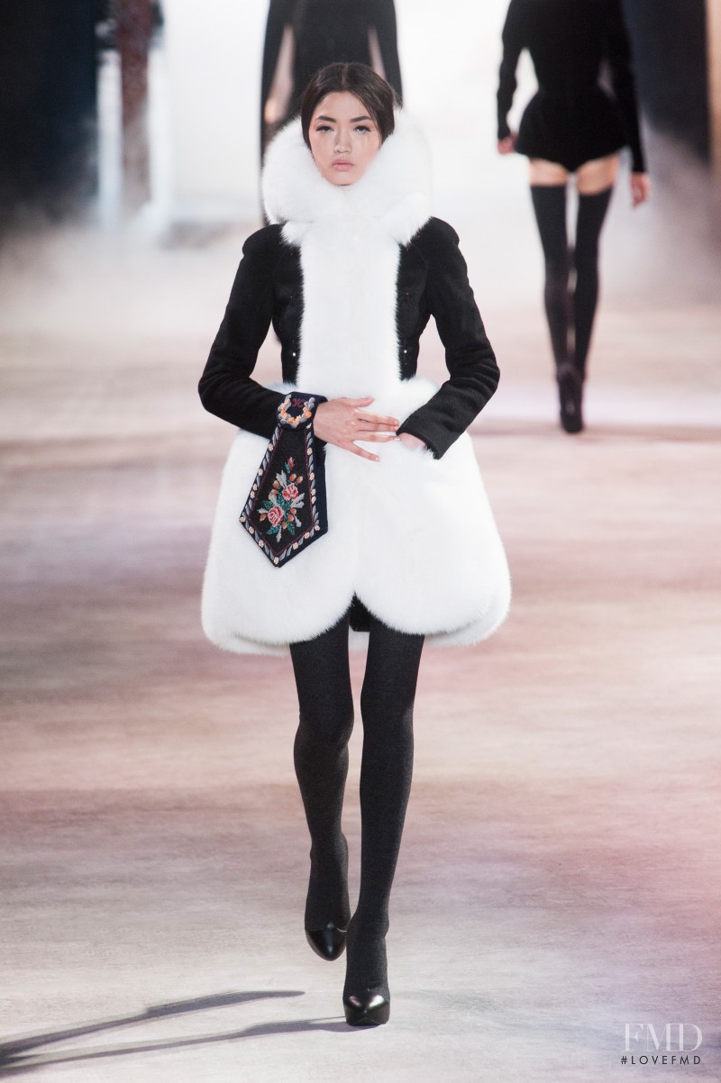 Qi Wen featured in  the Ulyana Sergeenko fashion show for Autumn/Winter 2013