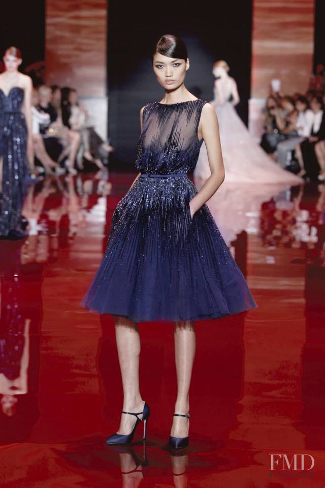 Qi Wen featured in  the Elie Saab Couture fashion show for Autumn/Winter 2013