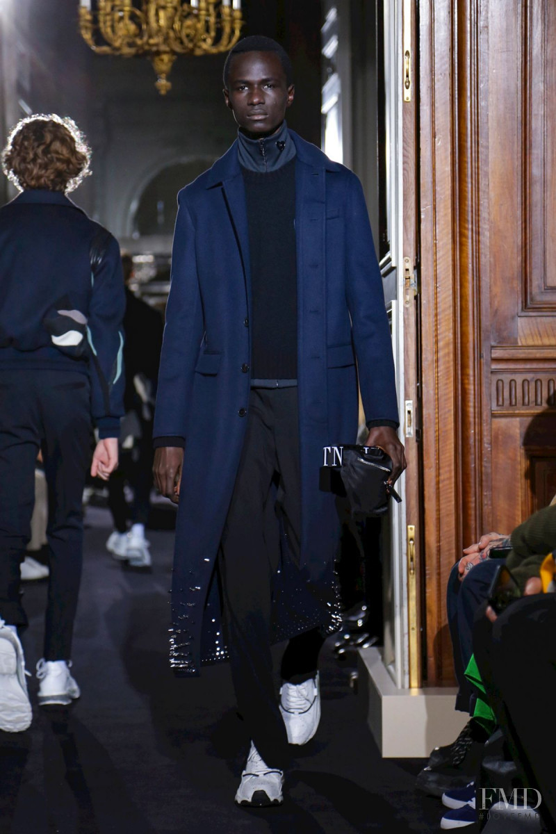 Malick Bodian featured in  the Valentino fashion show for Autumn/Winter 2018