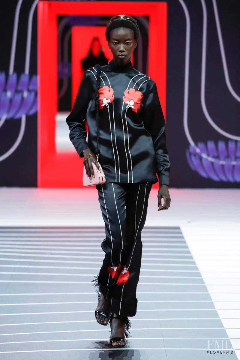 Anok Yai featured in  the Prada fashion show for Autumn/Winter 2020