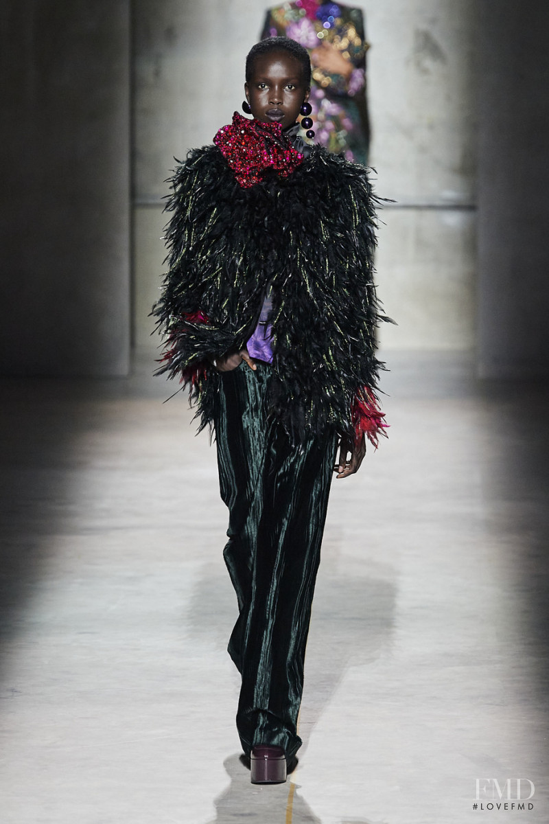 Ajok Madel featured in  the Dries van Noten fashion show for Autumn/Winter 2020
