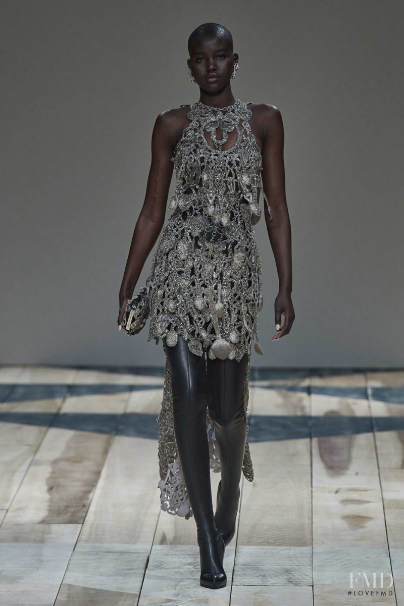 Adut Akech Bior featured in  the Alexander McQueen fashion show for Autumn/Winter 2020