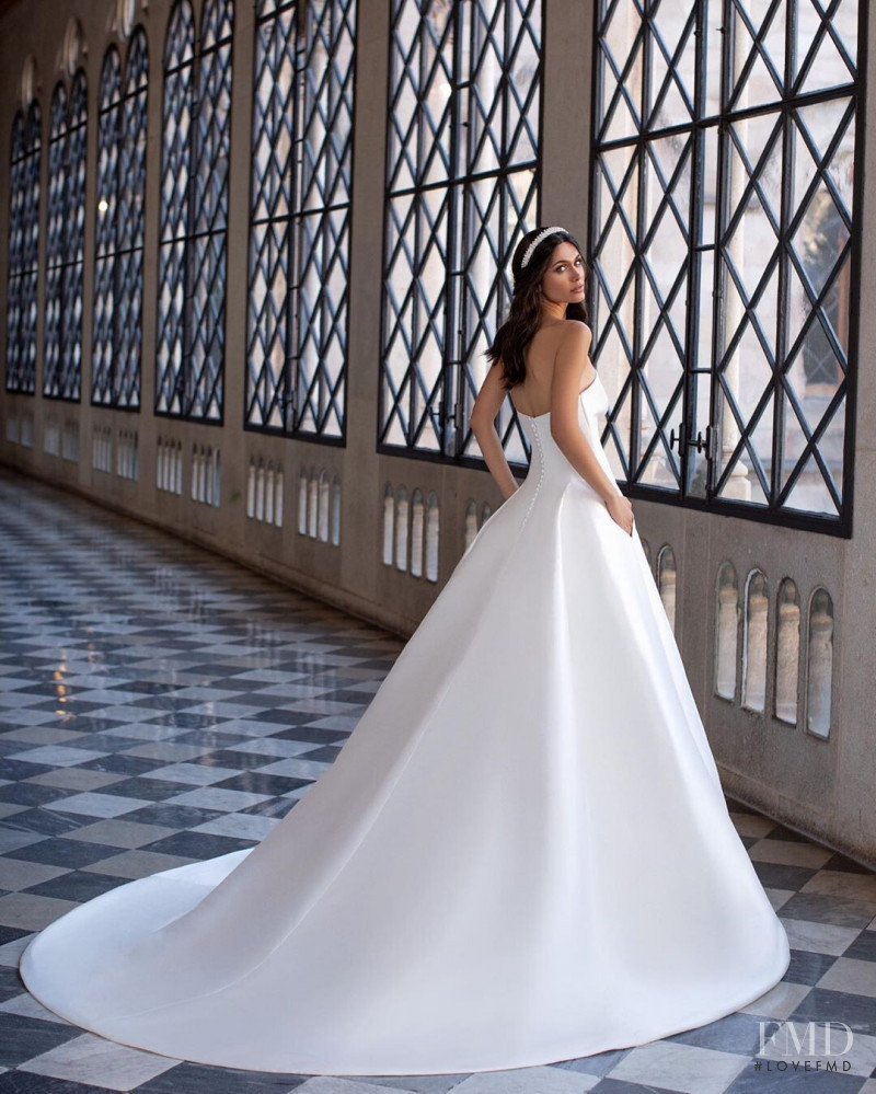 Victoria Bronova featured in  the Pronovias catalogue for Cruise 2021