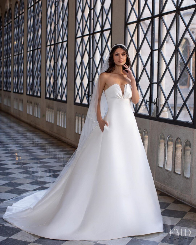 Victoria Bronova featured in  the Pronovias catalogue for Cruise 2021