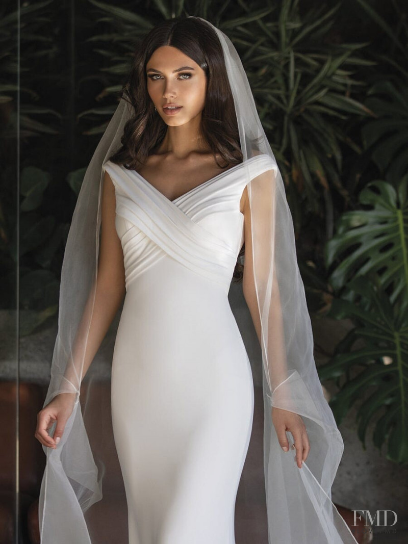 Victoria Bronova featured in  the Pronovias catalogue for Cruise 2021