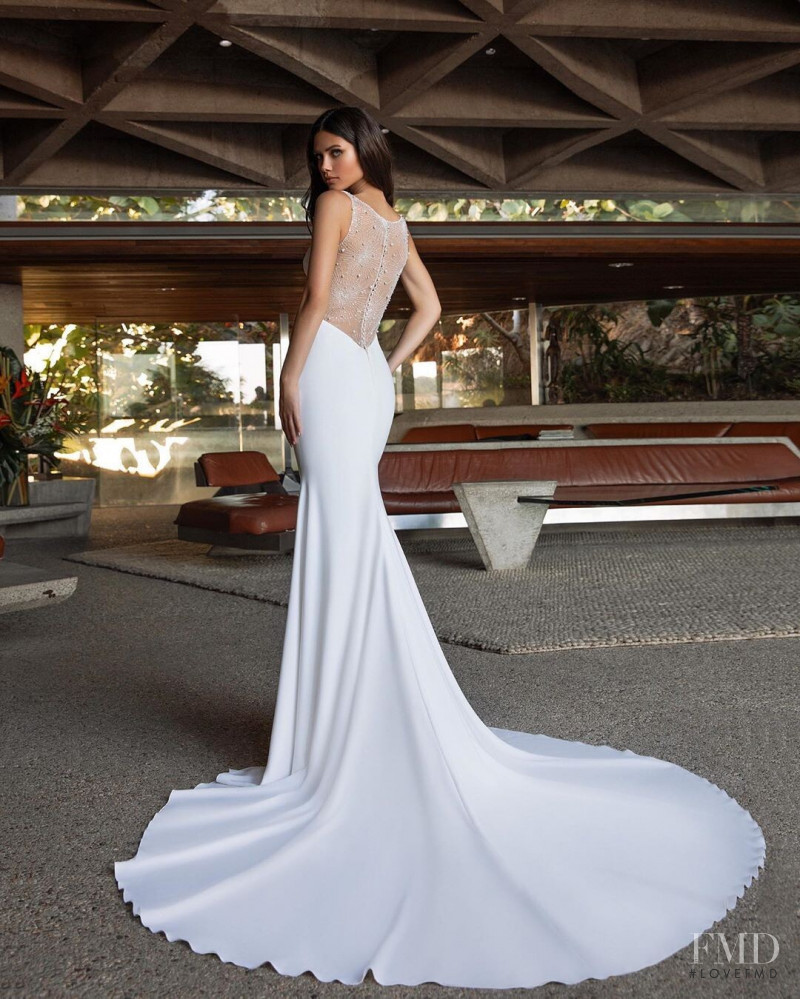 Victoria Bronova featured in  the Pronovias catalogue for Cruise 2021