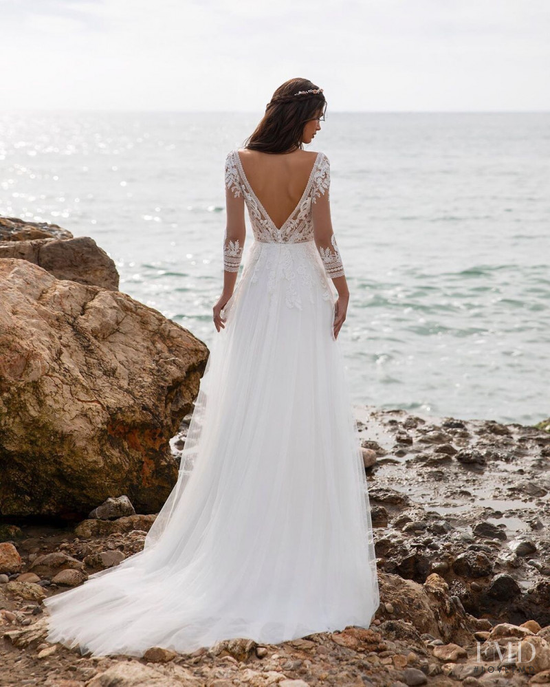 Victoria Bronova featured in  the Pronovias catalogue for Cruise 2021