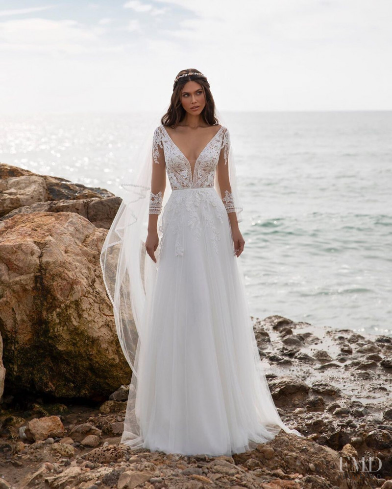 Victoria Bronova featured in  the Pronovias catalogue for Cruise 2021