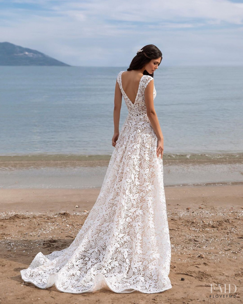 Victoria Bronova featured in  the Pronovias catalogue for Cruise 2021