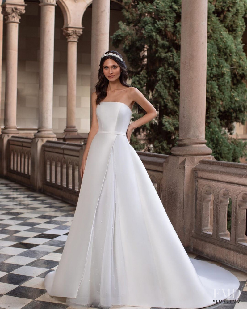 Victoria Bronova featured in  the Pronovias catalogue for Cruise 2021