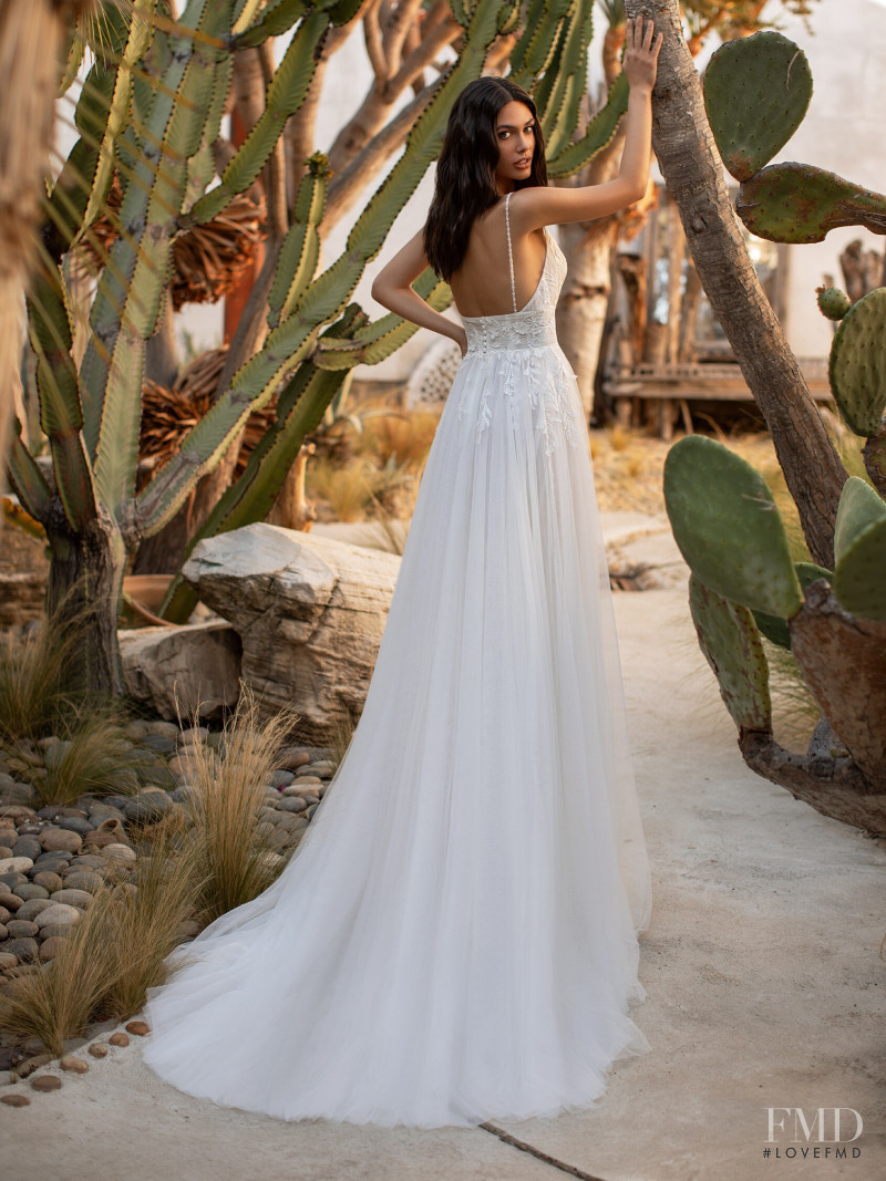 Victoria Bronova featured in  the Pronovias catalogue for Cruise 2021