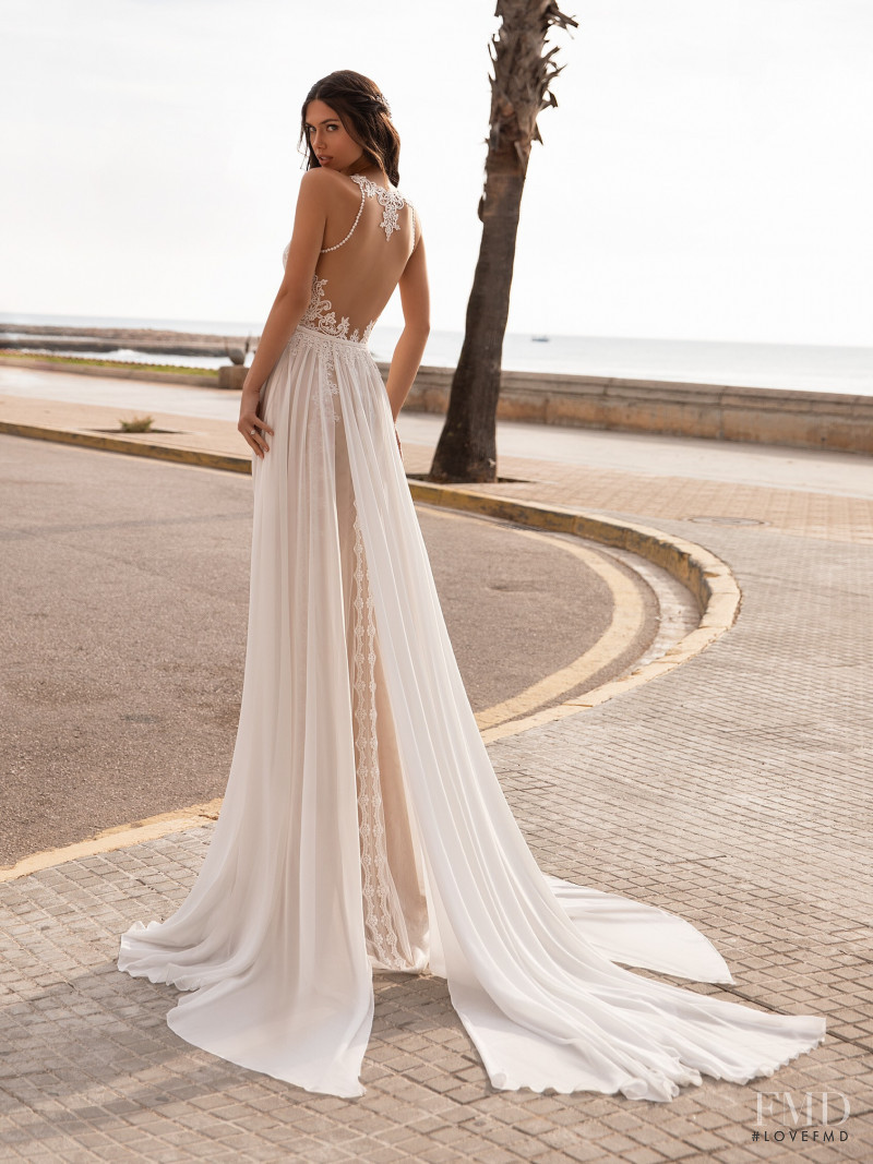 Victoria Bronova featured in  the Pronovias catalogue for Cruise 2021