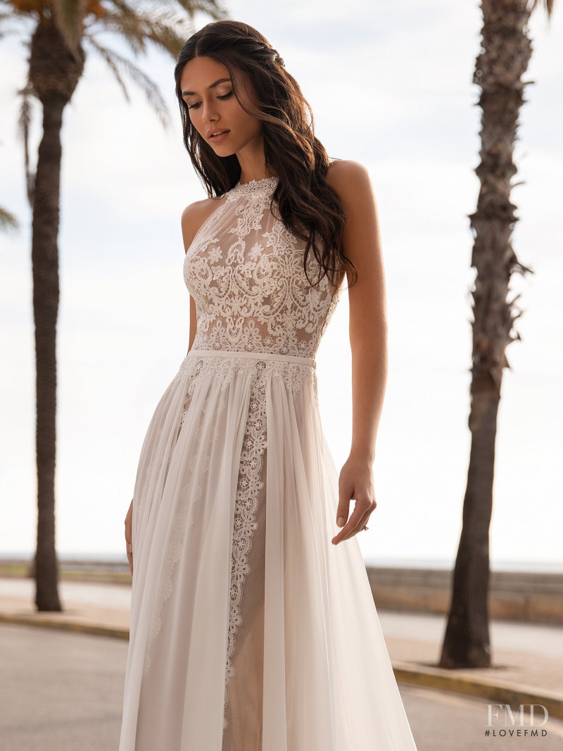 Victoria Bronova featured in  the Pronovias catalogue for Cruise 2021