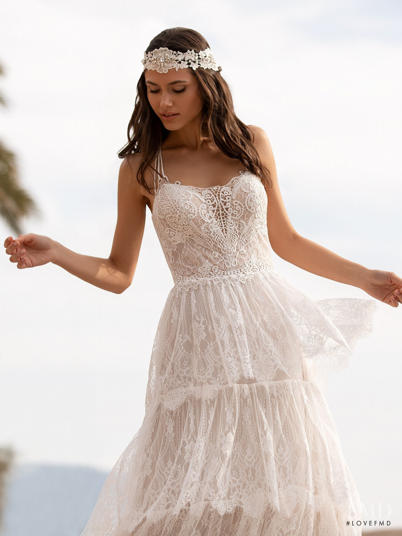 Victoria Bronova featured in  the Pronovias catalogue for Cruise 2021