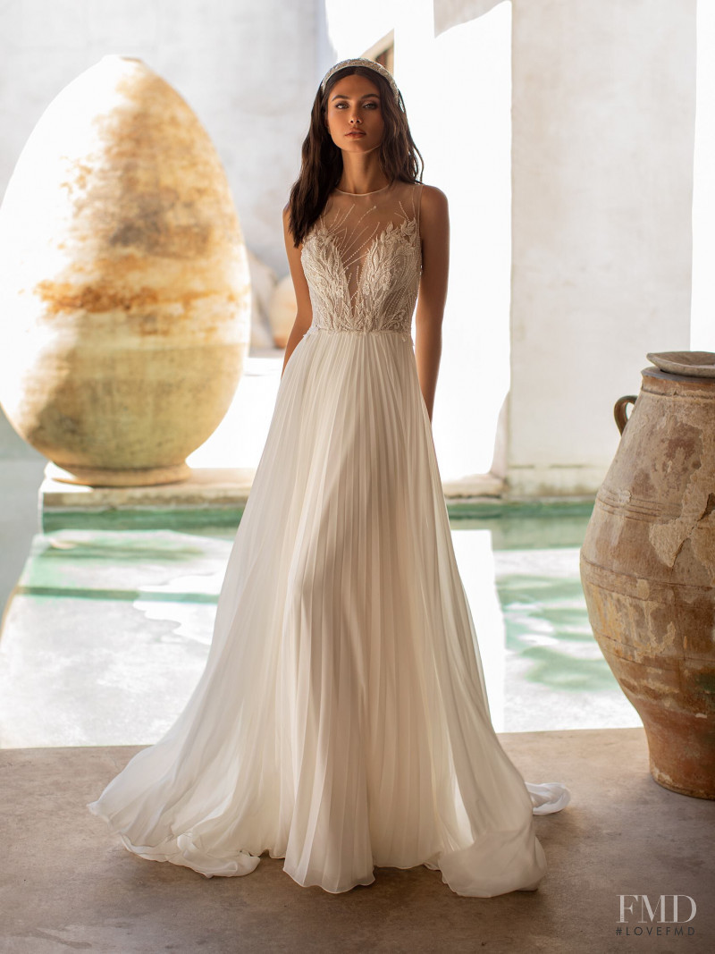 Victoria Bronova featured in  the Pronovias catalogue for Cruise 2021