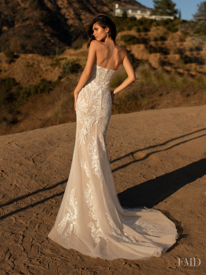 Victoria Bronova featured in  the Pronovias catalogue for Cruise 2021