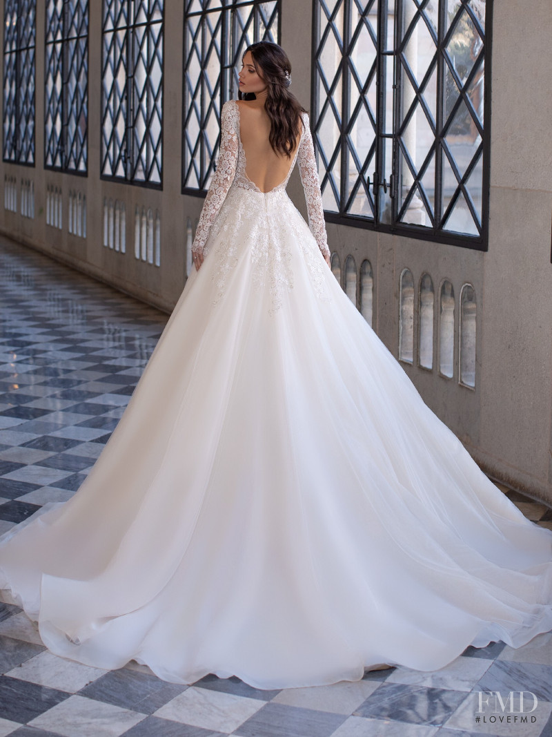 Victoria Bronova featured in  the Pronovias catalogue for Cruise 2021