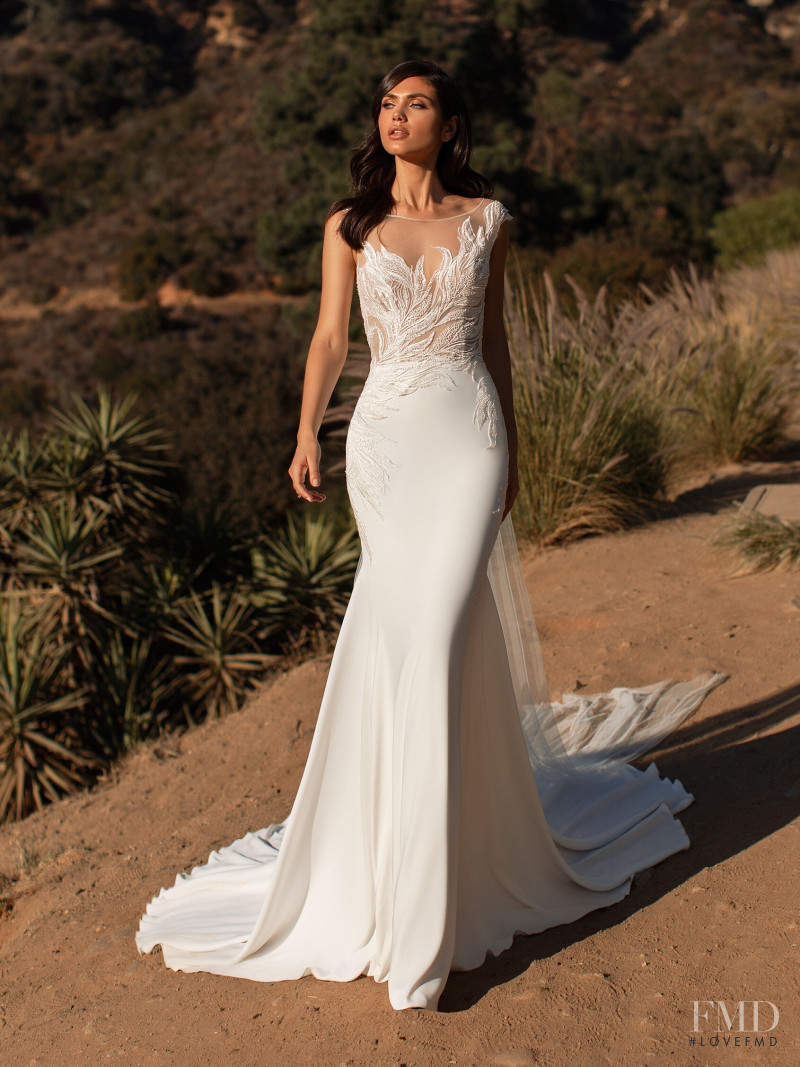 Victoria Bronova featured in  the Pronovias catalogue for Cruise 2021