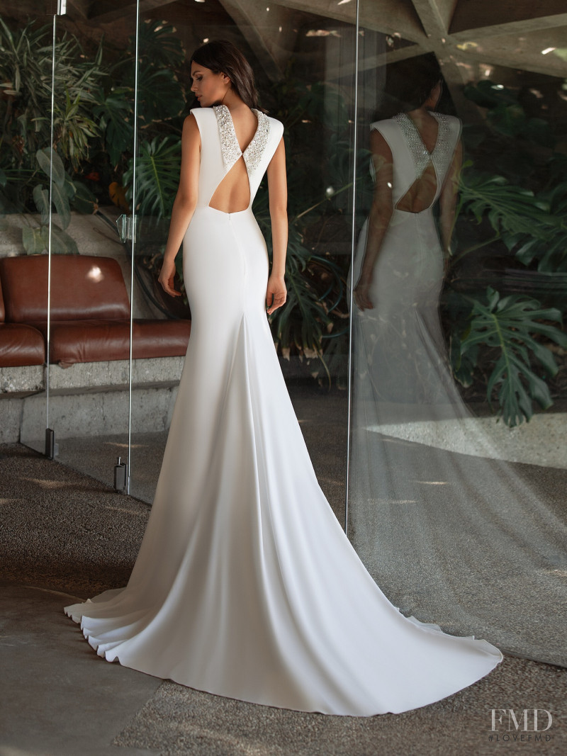 Victoria Bronova featured in  the Pronovias catalogue for Cruise 2021