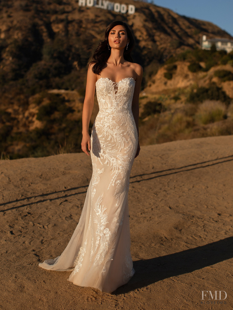 Victoria Bronova featured in  the Pronovias catalogue for Cruise 2021