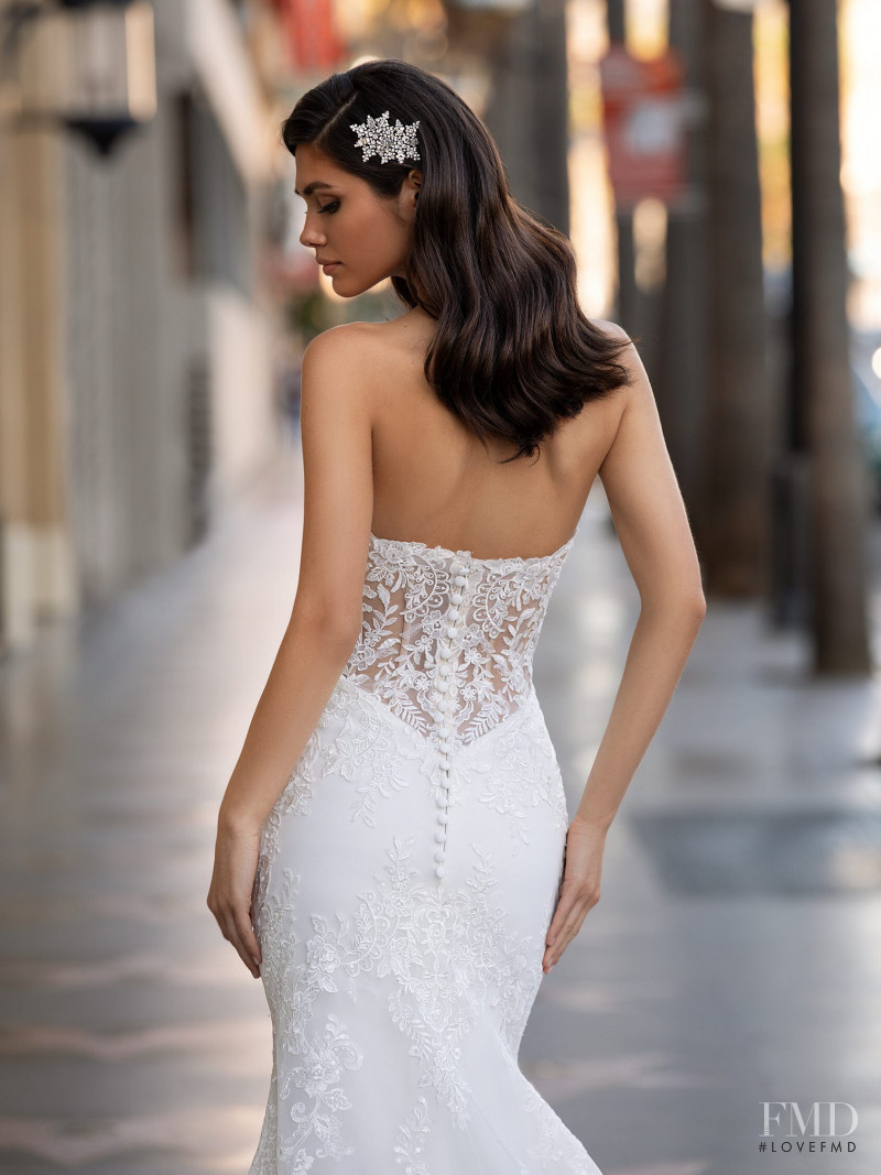 Victoria Bronova featured in  the Pronovias catalogue for Cruise 2021