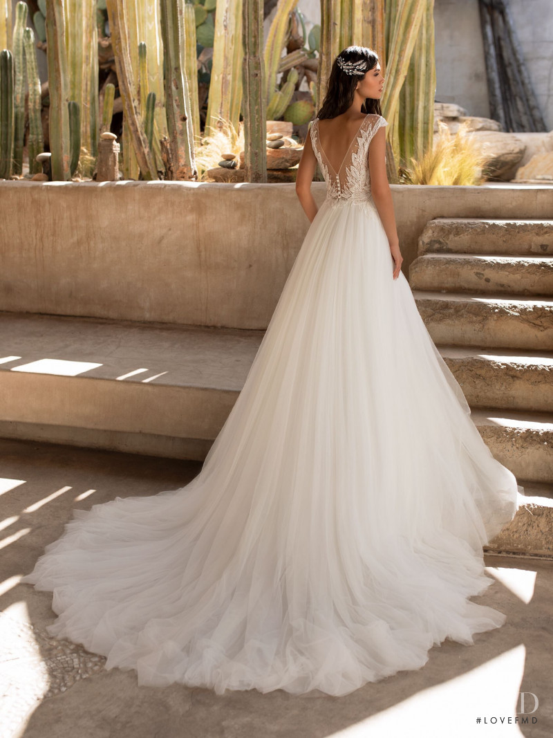 Victoria Bronova featured in  the Pronovias catalogue for Cruise 2021