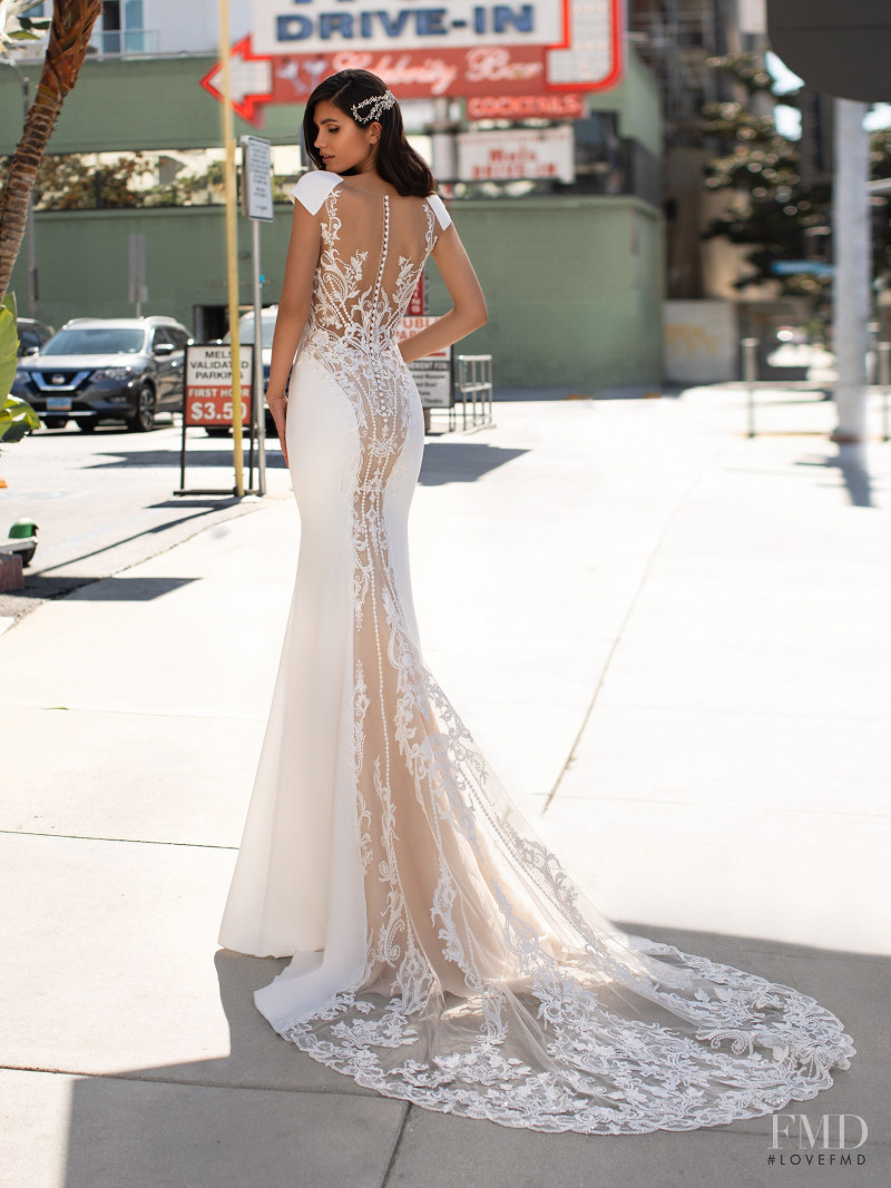 Victoria Bronova featured in  the Pronovias catalogue for Cruise 2021