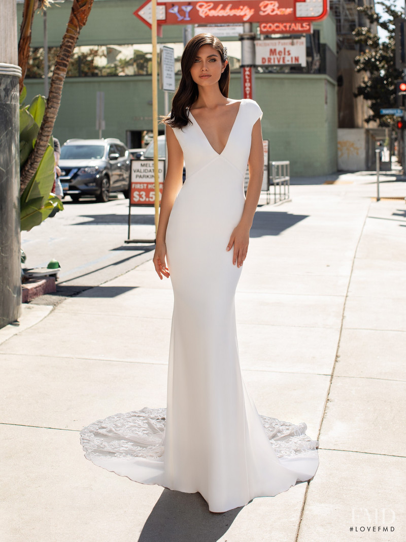 Victoria Bronova featured in  the Pronovias catalogue for Cruise 2021