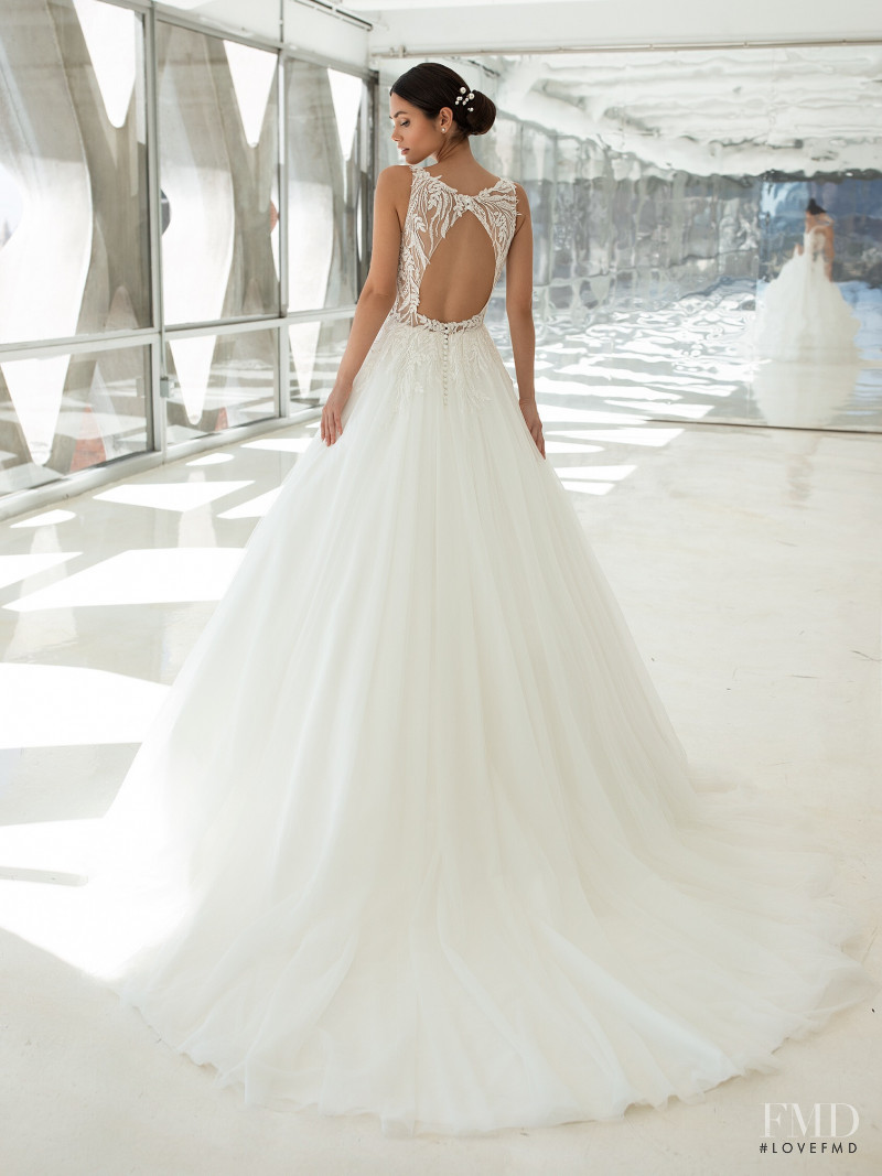 Victoria Bronova featured in  the Pronovias catalogue for Cruise 2021