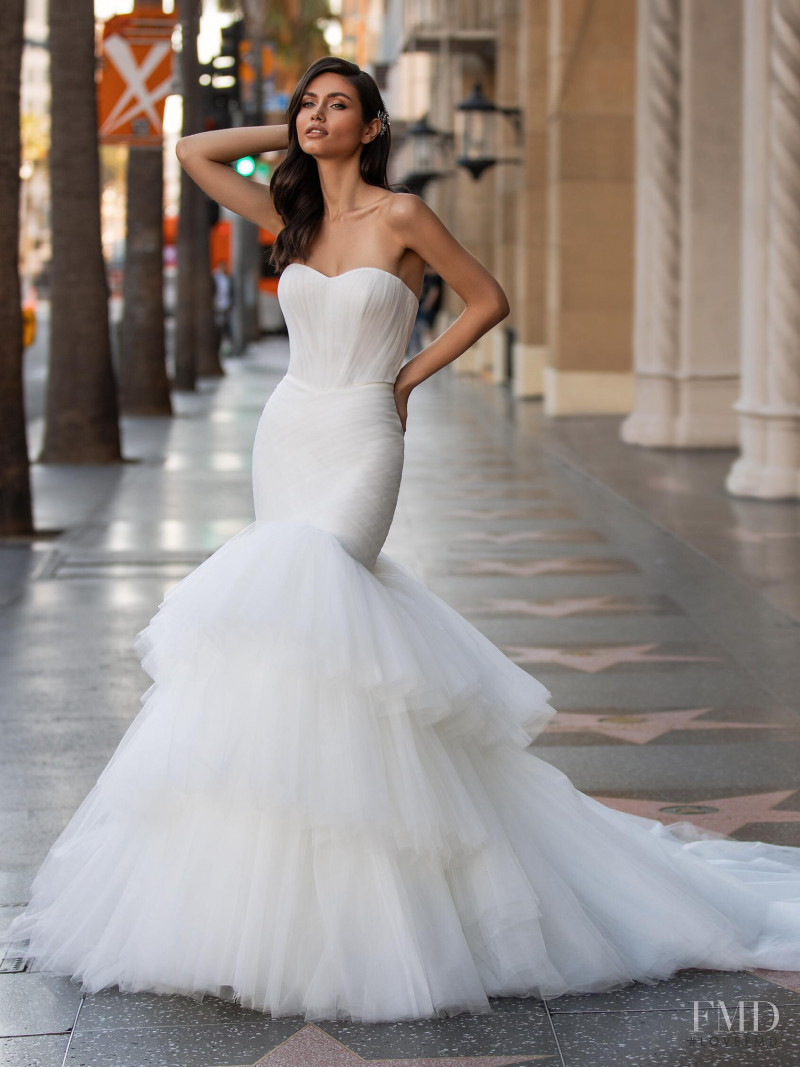 Victoria Bronova featured in  the Pronovias catalogue for Cruise 2021