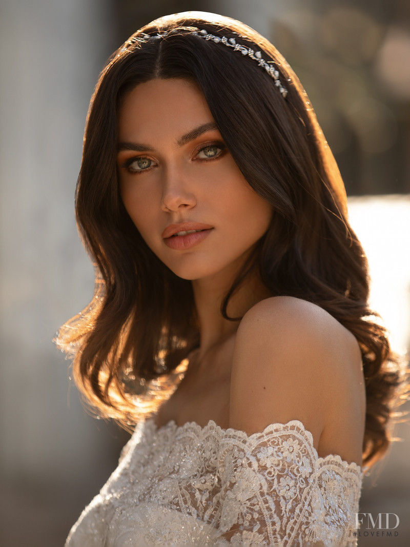 Victoria Bronova featured in  the Pronovias catalogue for Cruise 2021