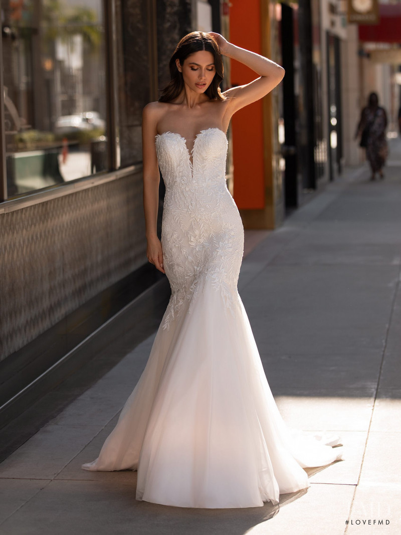 Victoria Bronova featured in  the Pronovias catalogue for Cruise 2021