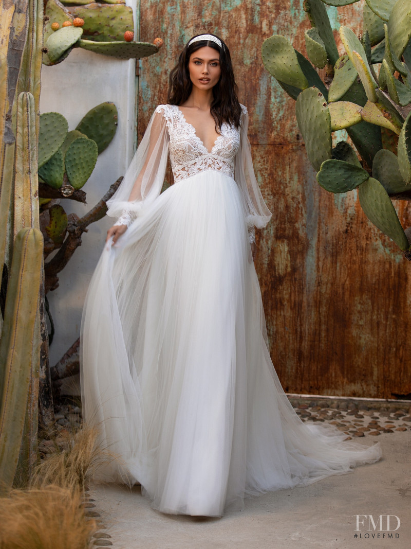 Victoria Bronova featured in  the Pronovias catalogue for Cruise 2021