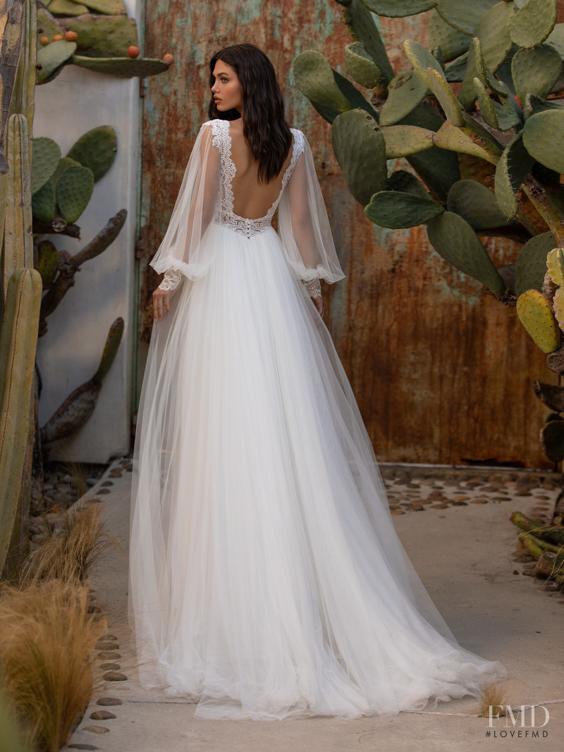 Victoria Bronova featured in  the Pronovias catalogue for Cruise 2021