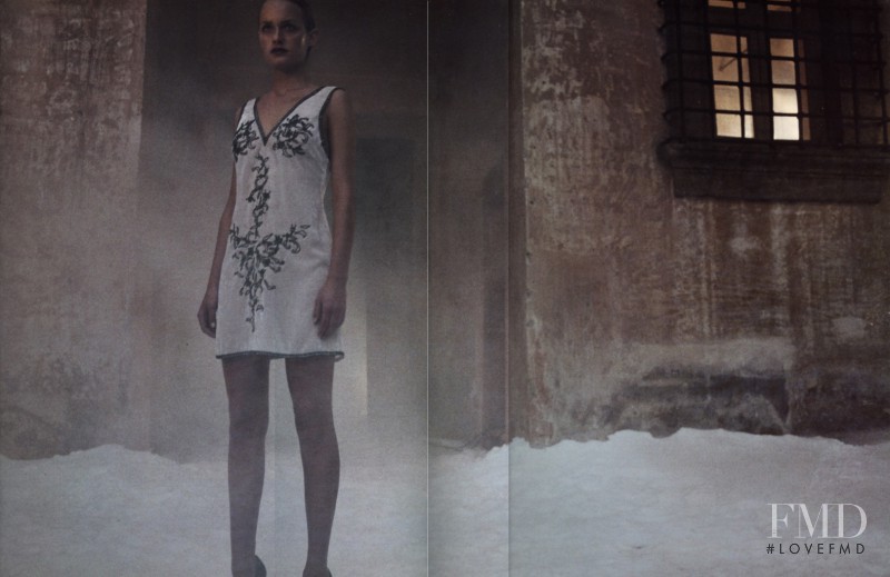 Amber Valletta featured in  the Prada advertisement for Spring/Summer 1997