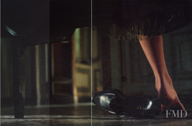 Amber Valletta featured in  the Prada advertisement for Spring/Summer 1997