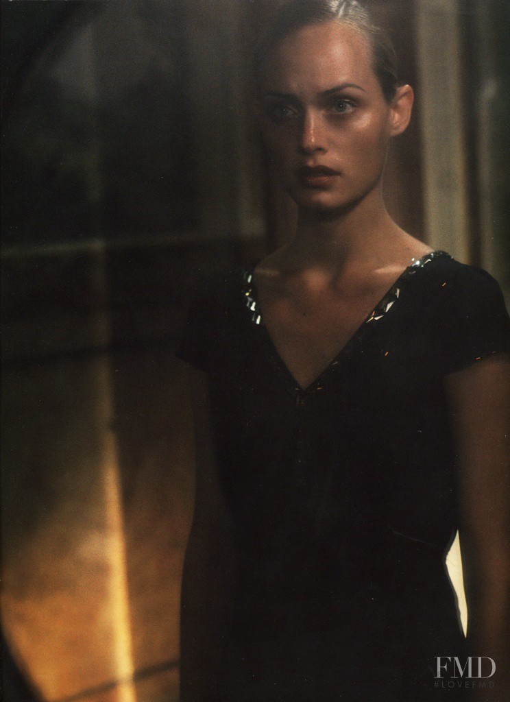 Amber Valletta featured in  the Prada advertisement for Spring/Summer 1997