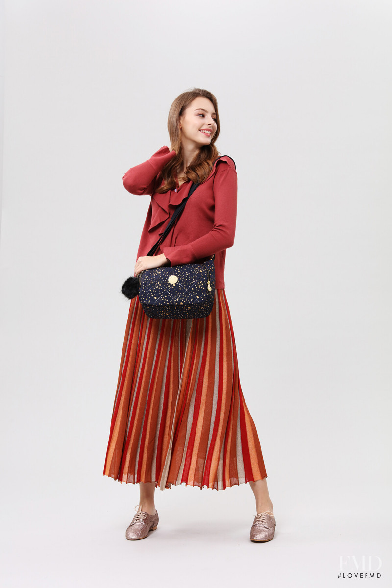 Marina Bondarko featured in  the Kipling catalogue for Summer 2019