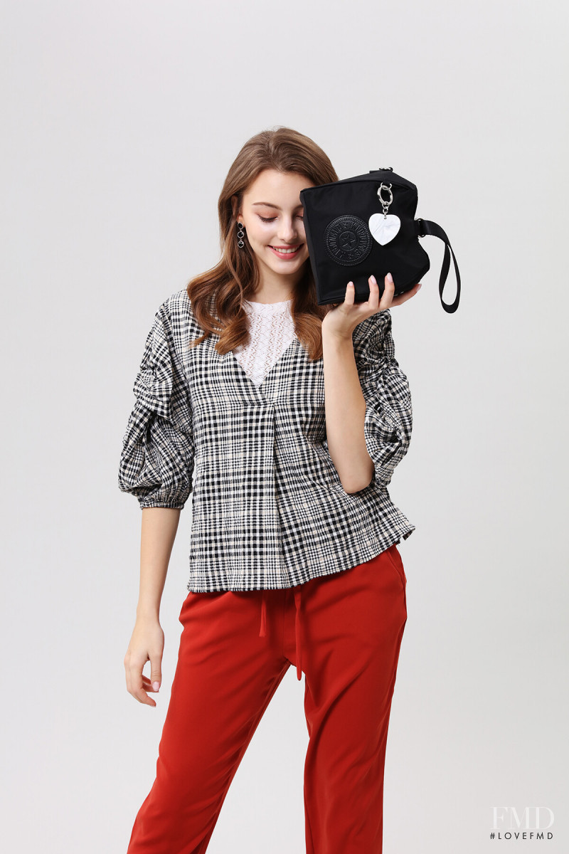 Marina Bondarko featured in  the Kipling catalogue for Summer 2019