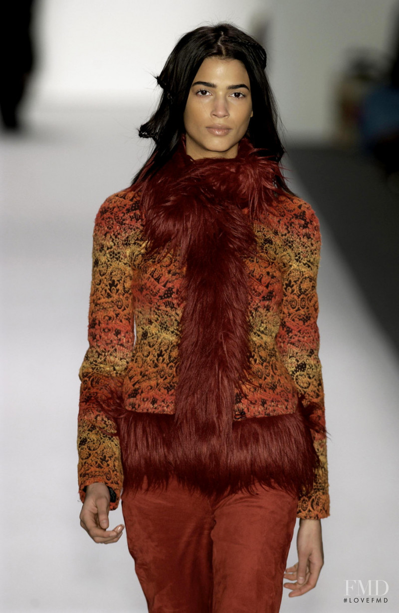 Teresa Lourenço featured in  the Vivienne Tam fashion show for Autumn/Winter 2002