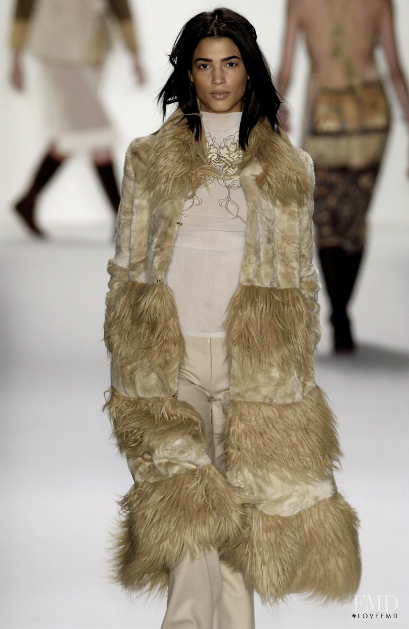 Teresa Lourenço featured in  the Vivienne Tam fashion show for Autumn/Winter 2002
